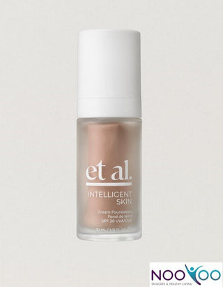 Bottle of et al. Intelligent Skin foundation on a light gray background