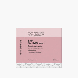 Box of Skin Youth Biome skincare supplement by Advanced Nutrition Programme on a light pink background